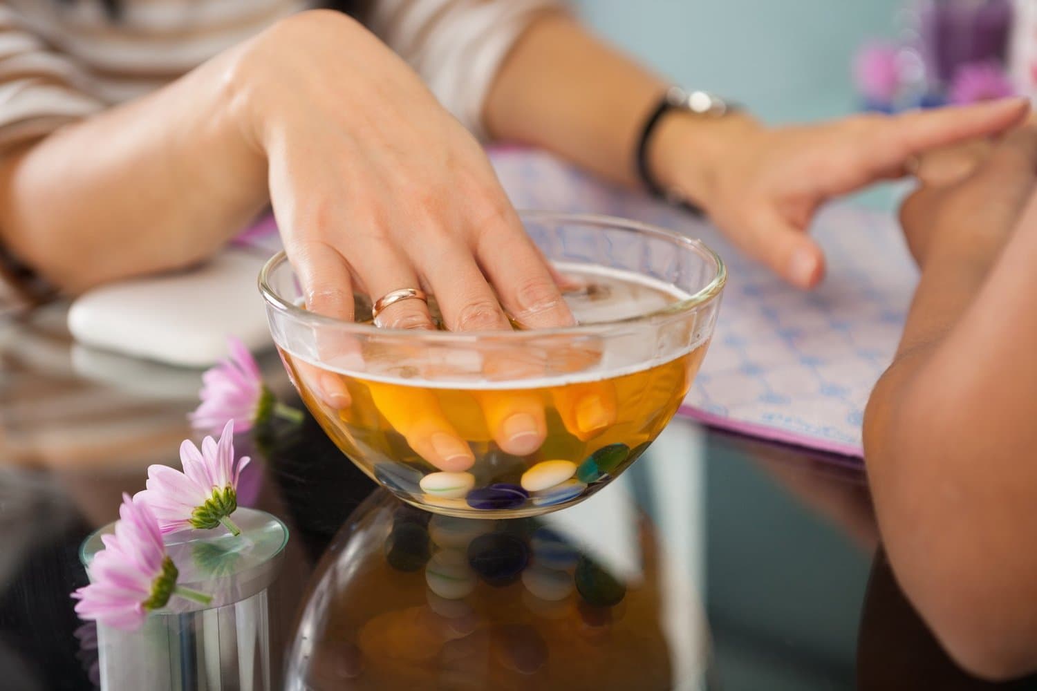 What are the benefits of Hot Oil Manicure?