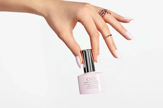How is nail lamination vs. gel manicure removed?